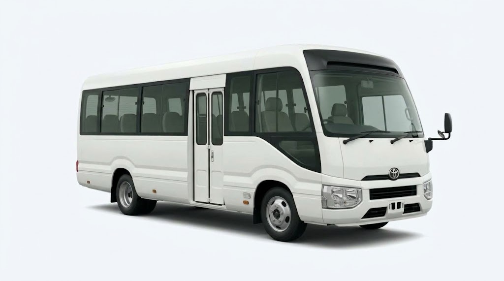 Toyota Coaster 5C with driver - Alpha Car Rentals