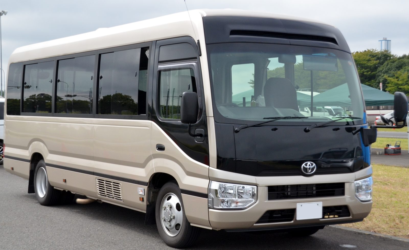 Toyota Coaster Saloon - van rental car
